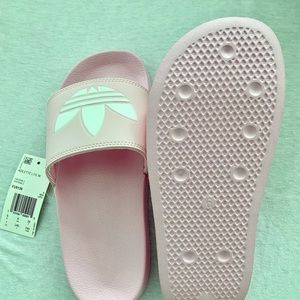 Brand new adidas slides.